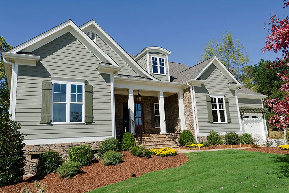 Exterior painted house with trees